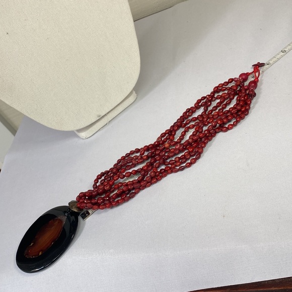 Beautiful multi strand red seed bead necklace with large medallion - Picture 5 of 9